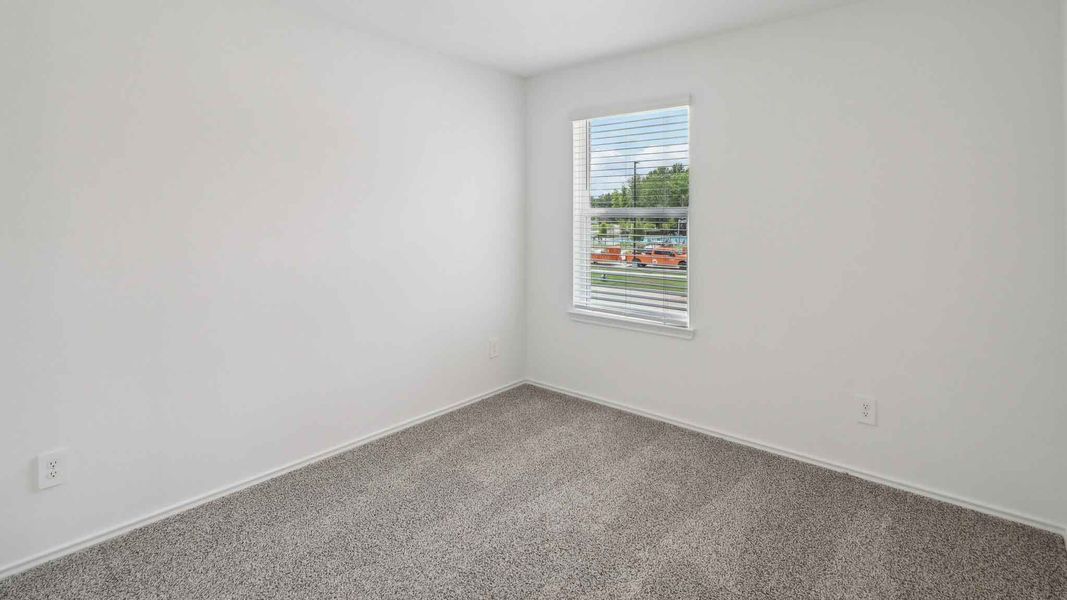 Spacious, unfurnished interior of a new home in Grand Pines, Magnolia (Image 22).