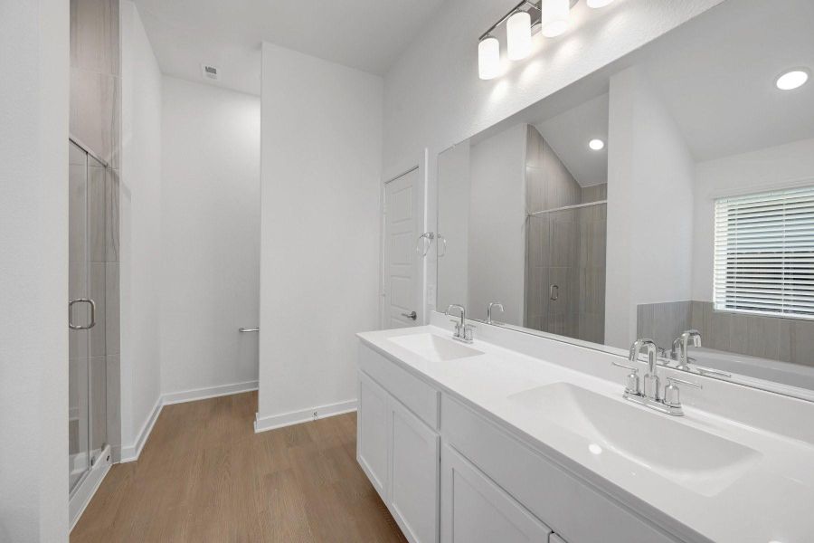 Furnished interior view inside a new home in Lone Star Landing, Montgomery (Image 12).