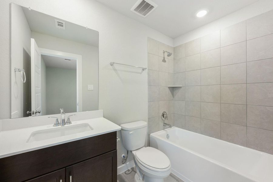 Furnished interior view inside a new home in Heights of Barbers Hill, Mont Belvieu (Image 10).