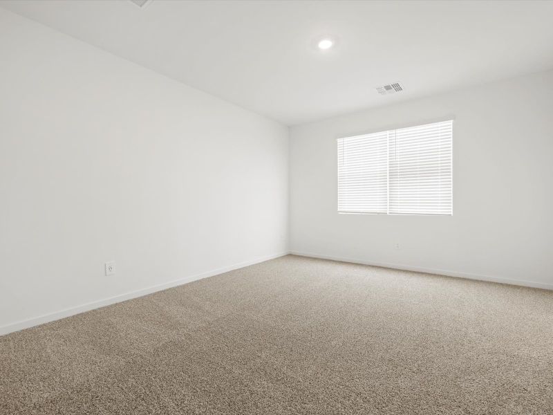 Spacious, unfurnished interior of a new home in Rancho Mirage Estate Series, Maricopa (Image 10).