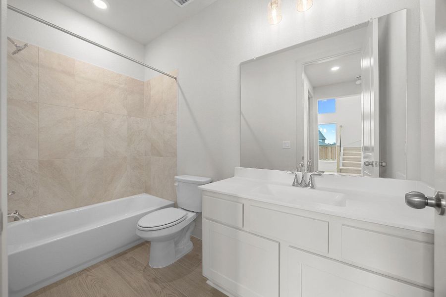 Furnished interior view inside a new home in Parmer Ranch, Georgetown (Image 11).