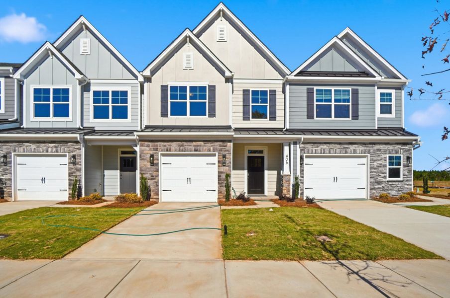 Front exterior of a new home in Blythe Mill Townhomes, Waxhaw, NC, highlighting curb appeal (Image 1).