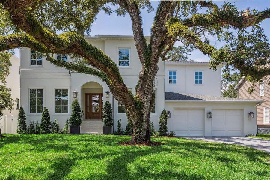 Front exterior of a new home in , Tampa, FL, highlighting curb appeal (Image 24). Front exterior of a new home in , Tampa, FL, highlighting curb appeal (Image 24).