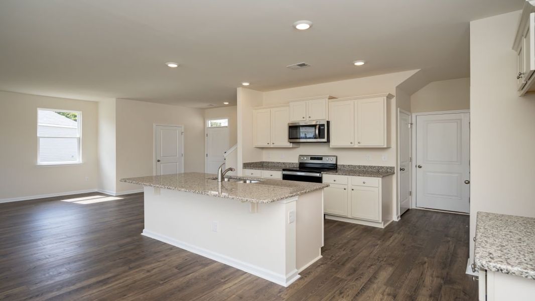 Furnished interior view inside a new home in The Pines at Blake Farm, Wilmington (Image 8).