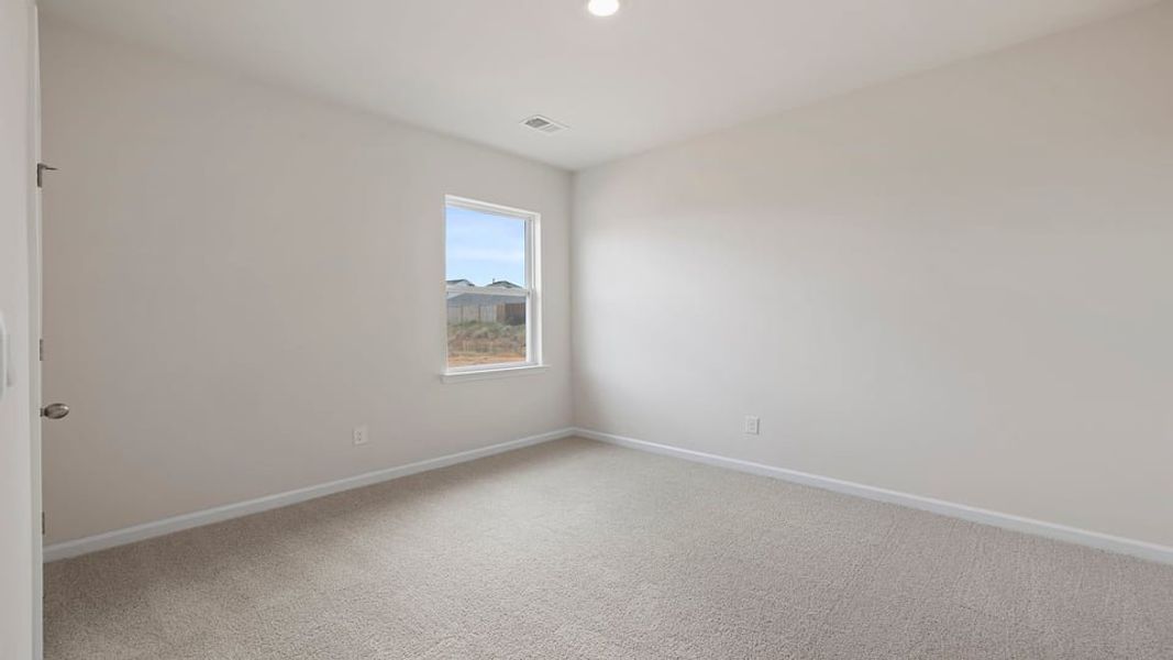 Spacious, unfurnished interior of a new home in Durbin Meadows Traditions, Fountain Inn (Image 18).