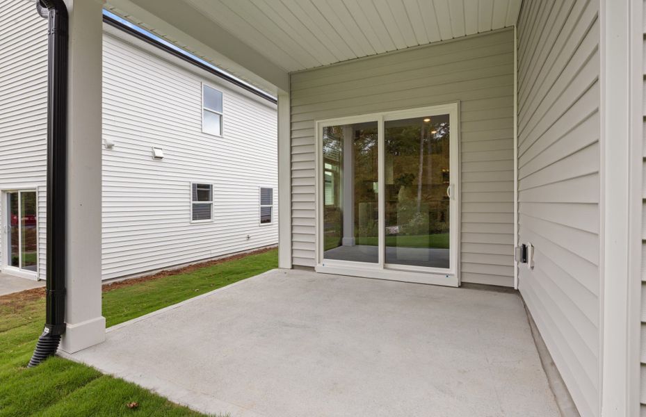 Exterior details and patio area of a home in Carpenter Falls, Durham (Image 22).