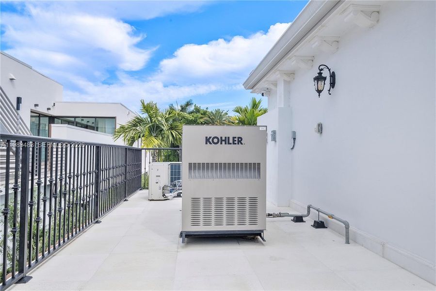 Exterior details and patio area of a home in , Surfside (Image 33).