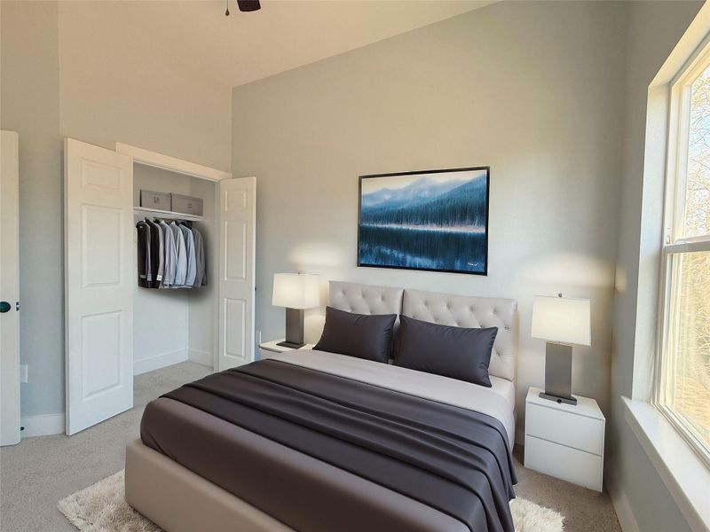 This is the third bedroom full of Natural Light. It is spacious and has ample closet space. Staged