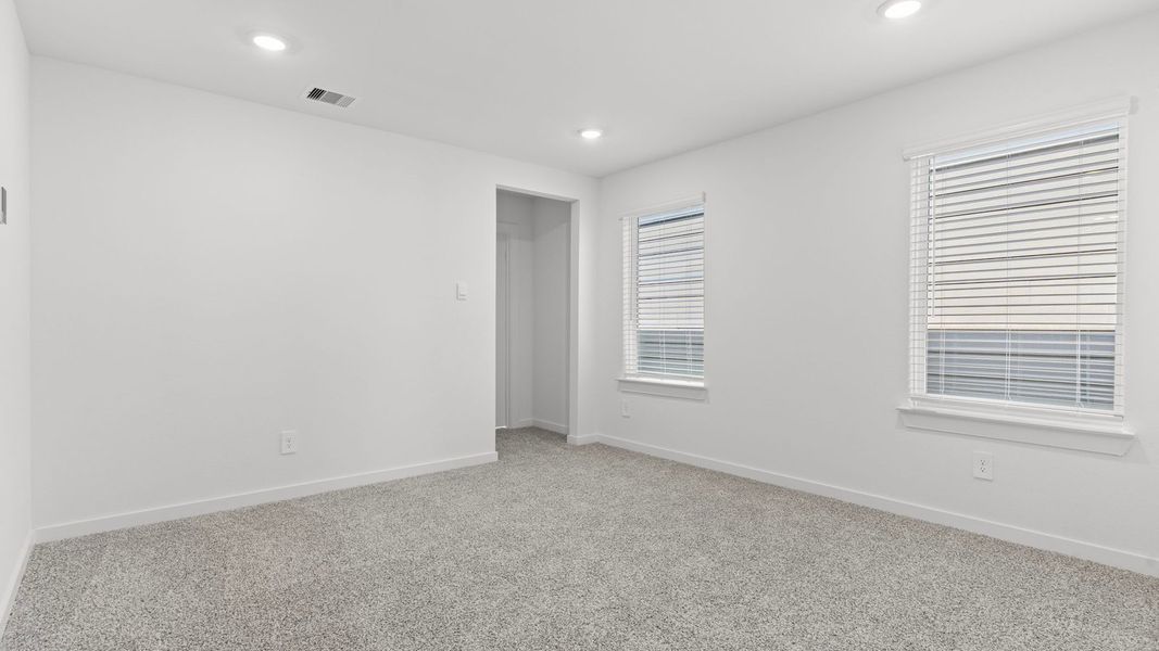 Spacious, unfurnished interior of a new home in Villarosa at Tamarron, Katy (Image 41).