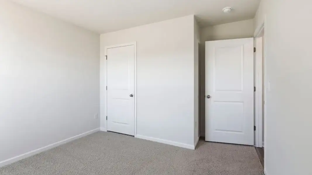 Spacious, unfurnished interior of a new home in Waverly Station, Greenwood (Image 21).