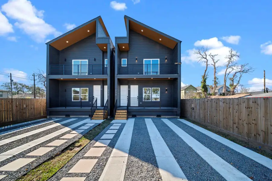 Front exterior of a new home in , Houston, TX, highlighting curb appeal (Image 16).