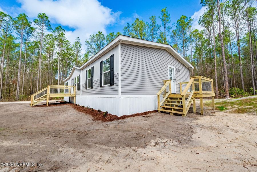 Exterior details and patio area of a home in , Lake Butler (Image 20).