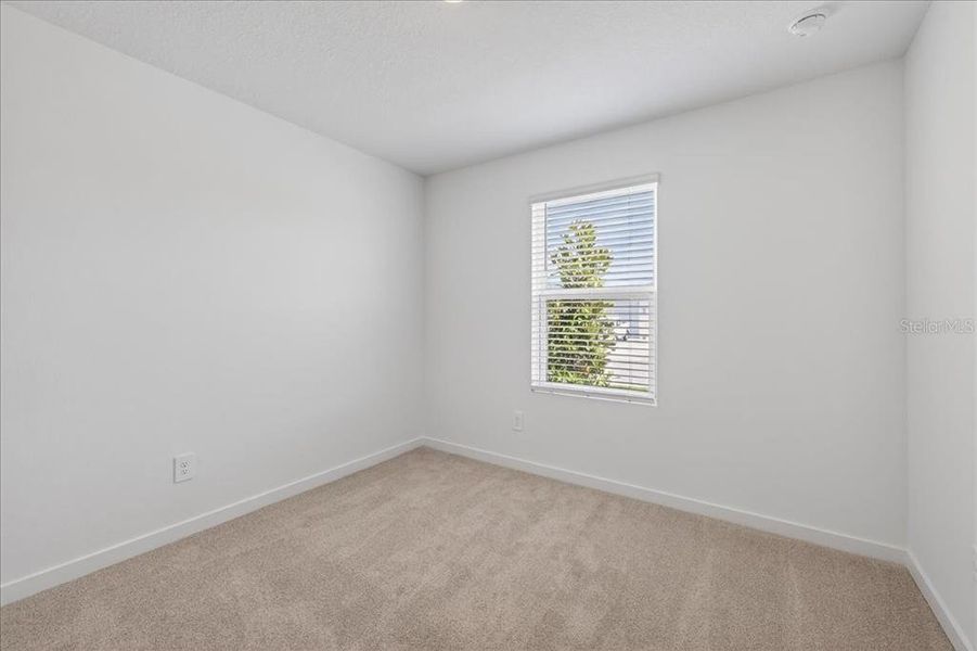 Spacious, unfurnished interior of a new home in Colbert Landings, Palm Coast (Image 31).