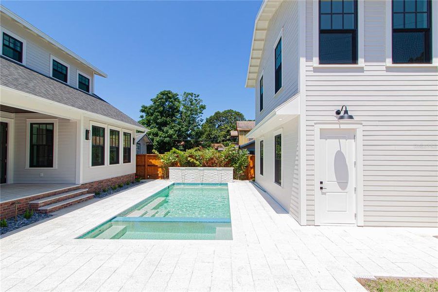 Front exterior of a new home in , St. Petersburg, FL, highlighting curb appeal (Image 18).