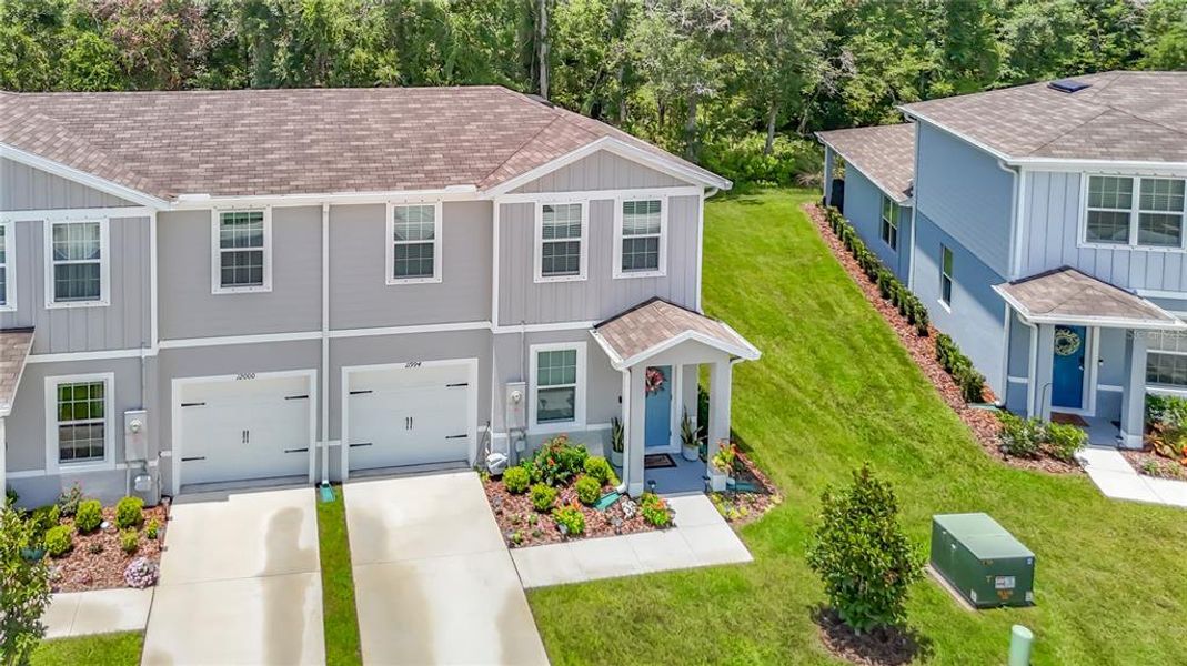 Front exterior of a new home in , New Port Richey, FL, highlighting curb appeal (Image 25).