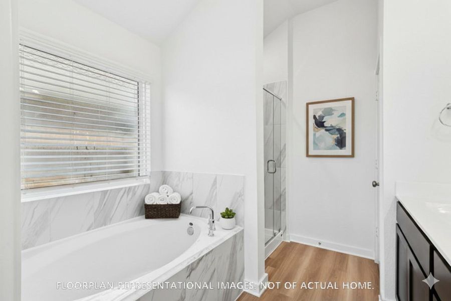 Furnished interior view inside a new home in Lone Star Landing, Montgomery (Image 6).