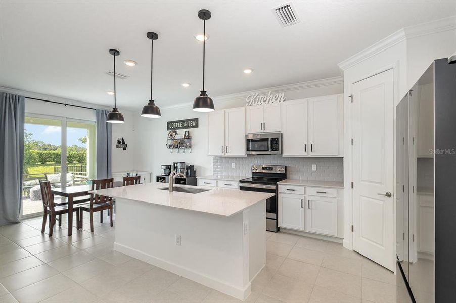 Furnished interior view inside a new home in , Palm Bay (Image 13). Furnished interior view inside a new home in , Palm Bay (Image 13).