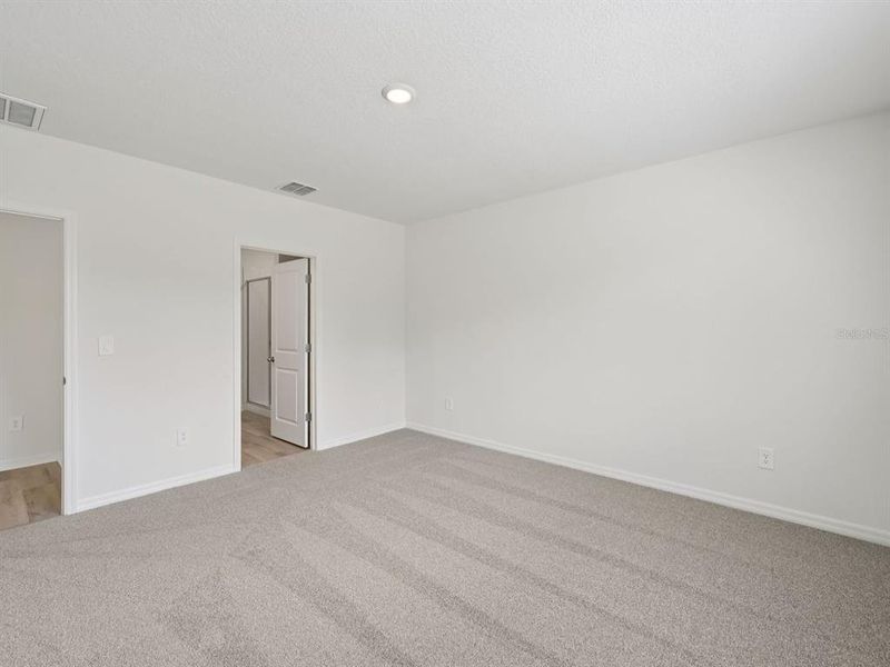 Spacious, unfurnished interior of a new home in The Reserve at Van Oaks, Auburndale (Image 21).