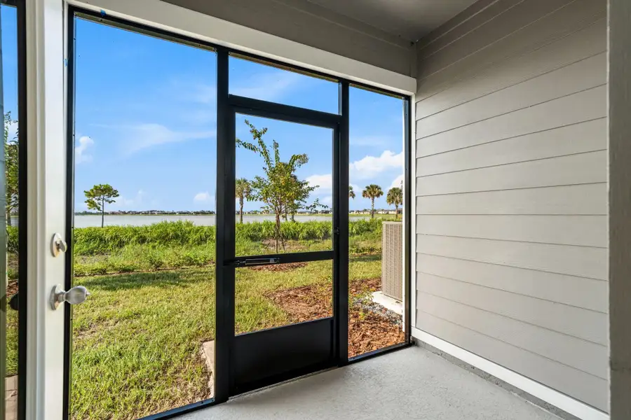 Exterior details and patio area of a home in Catamaran Cove, Rockledge (Image 22).