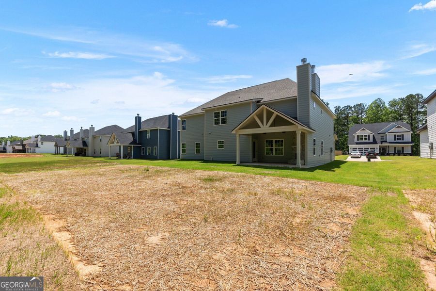 Exterior details and patio area of a home in Juliette Crossing, Forsyth (Image 4).