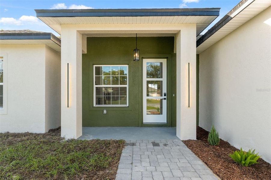 Exterior details and patio area of a home in , Ocala (Image 4).