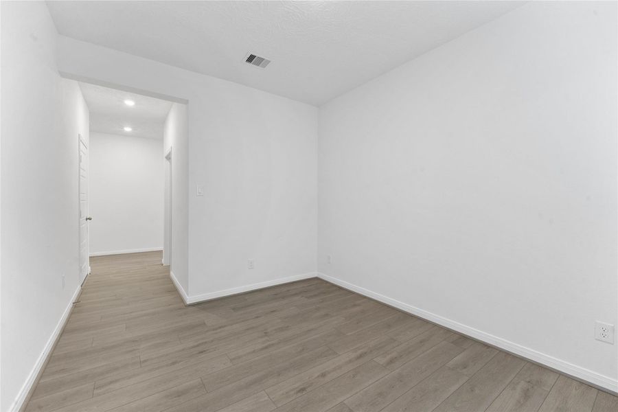 Additional view from Den to the hallway.