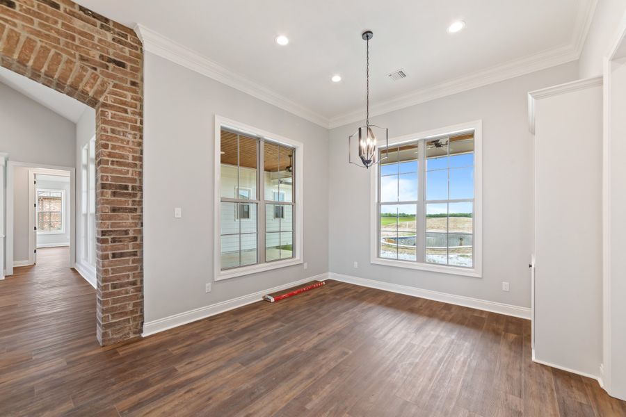 Representative unfurnished interior of a home built from the The Lafitte by Manuel Builders in Chapel Bend, Montgomery (Image 29).