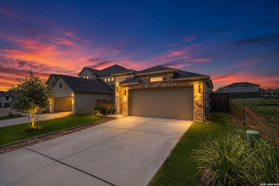 Front exterior of a new home in Ladera, San Antonio, TX, highlighting curb appeal (Image 1). Front exterior of a new home in Ladera, San Antonio, TX, highlighting curb appeal (Image 1).