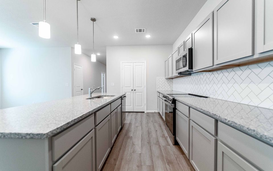Furnished interior view inside a new home in Grande Estates, Bertram (Image 4). Furnished interior view inside a new home in Grande Estates, Bertram (Image 4).