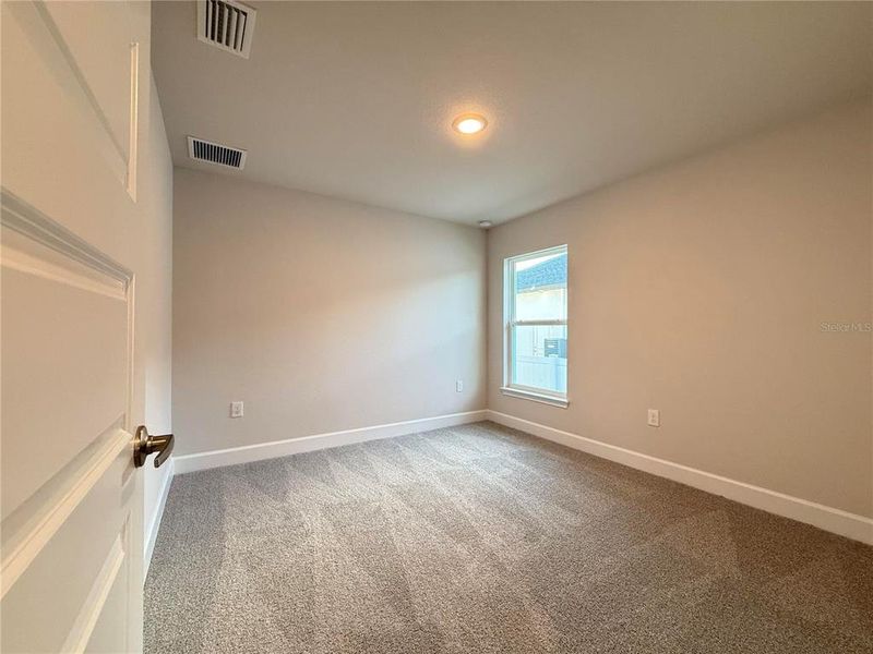 Spacious, unfurnished interior of a new home in , Port Charlotte (Image 20).