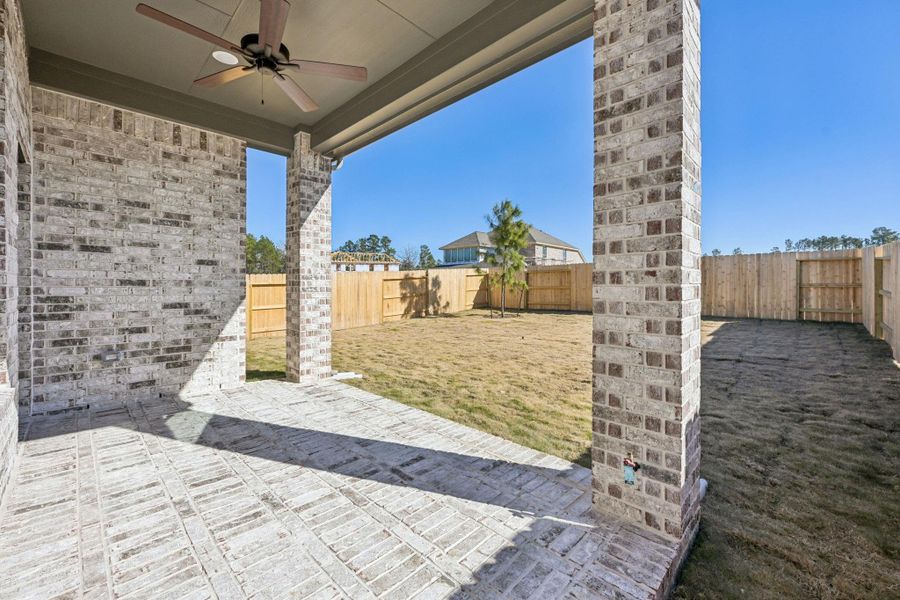 Exterior details and patio area of a home in Evergreen, Conroe (Image 3).