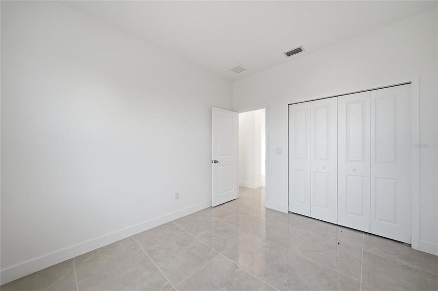 Spacious, unfurnished interior of a new home in , Port Charlotte (Image 39).