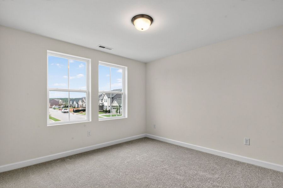 Representative unfurnished interior of a home built from the The Redbud by David Weekley Homes in Serenity - The Village Collection, Fuquay Varina (Image 10).