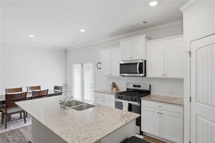 Furnished interior view inside a new home in , Buford (Image 10).