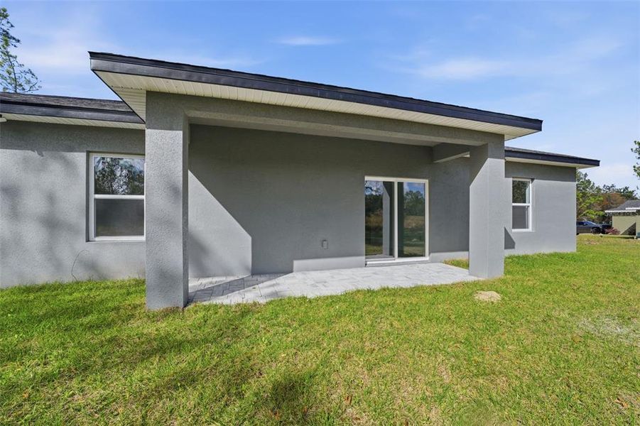 Exterior details and patio area of a home in , Citrus Springs (Image 20).