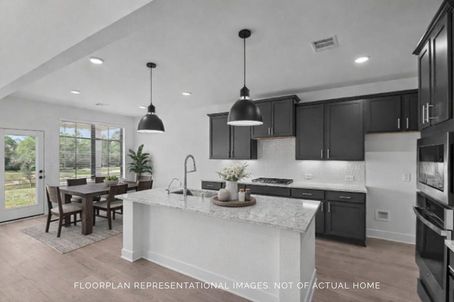 Furnished interior view inside a new home in Lone Star Landing, Montgomery (Image 6).