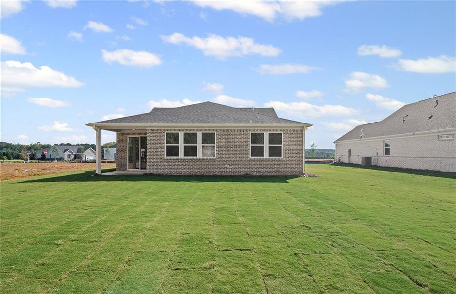 Exterior details and patio area of a home in Overland, Locust Grove (Image 20).