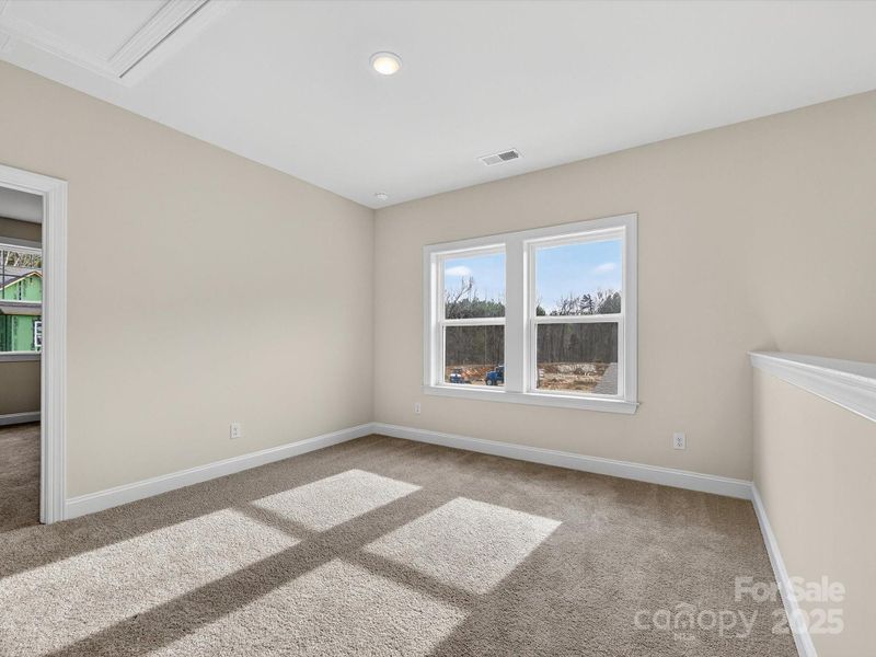 Spacious, unfurnished interior of a new home in North Creek Village, Huntersville (Image 28).