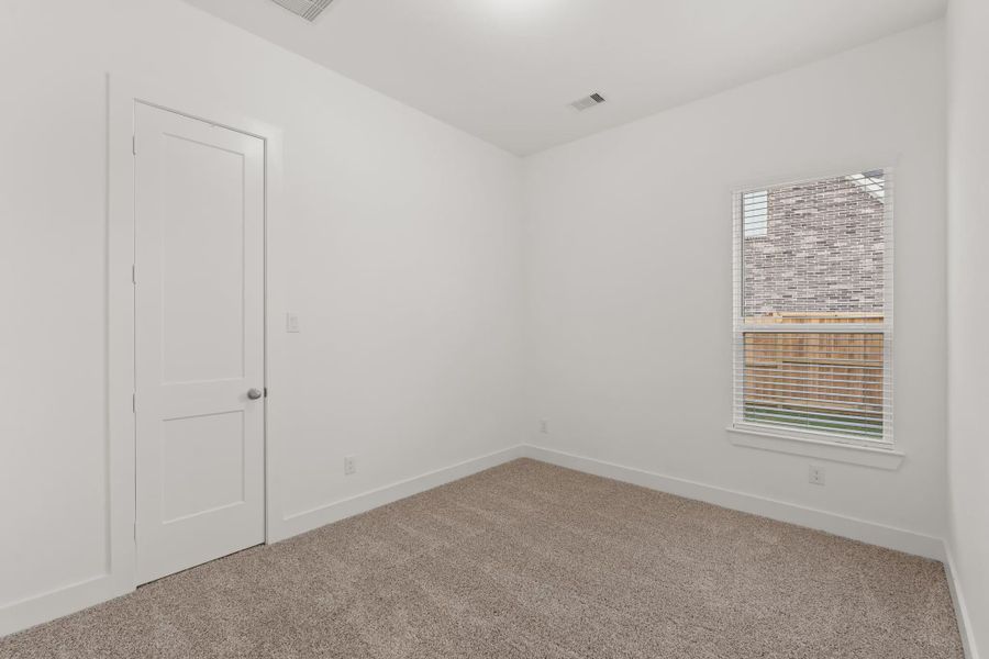 Representative unfurnished interior of a home built from the Mickelson by Chesmar Homes in Riceland Alley Loads, Mont Belvieu (Image 97).