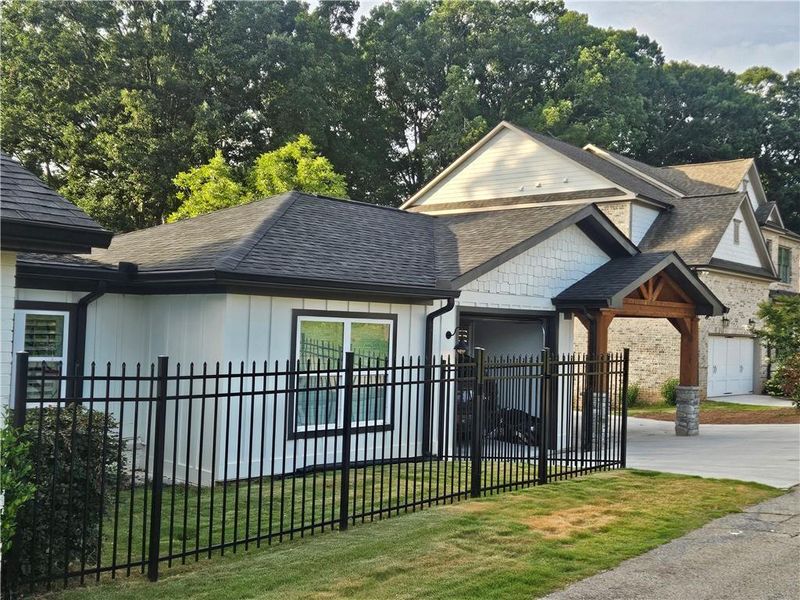 Front exterior of a new home in , Buford, GA, highlighting curb appeal (Image 25).