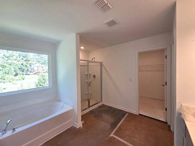 Primary Bathroom Walk-In Shower featuring Milan Collection Finishes Construction Progress