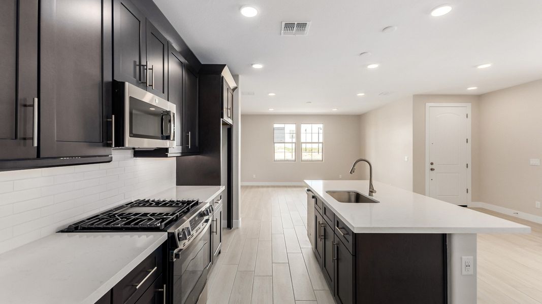 Representative furnished interior of a home built from the The Delaney by DRB Homes in Surprise City Center, Surprise (Image 12).