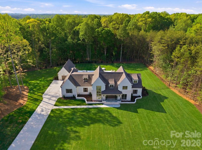 Front exterior of a new home in , Davidson, NC, highlighting curb appeal (Image 26).