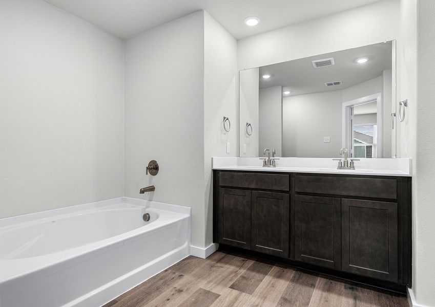 The master bathroom has a garden tub. The master bathroom has a garden tub.