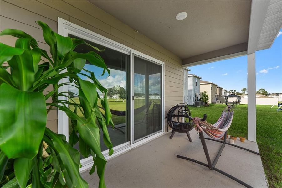 Exterior details and patio area of a home in Avalon Woods, Newberry (Image 3).