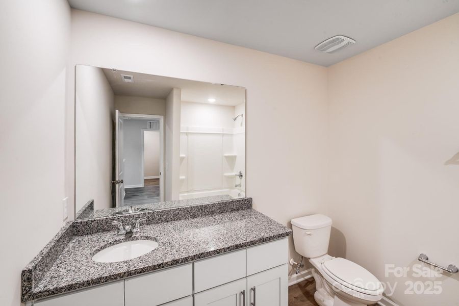 Furnished interior view inside a new home in , Statesville (Image 12).