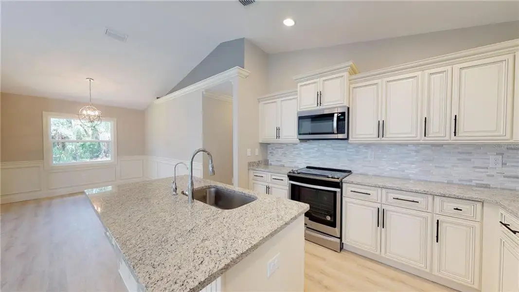 Furnished interior view inside a new home in , North Port (Image 9).