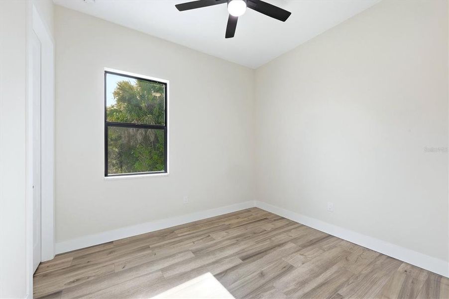 Spacious, unfurnished interior of a new home in , Port Charlotte (Image 35).