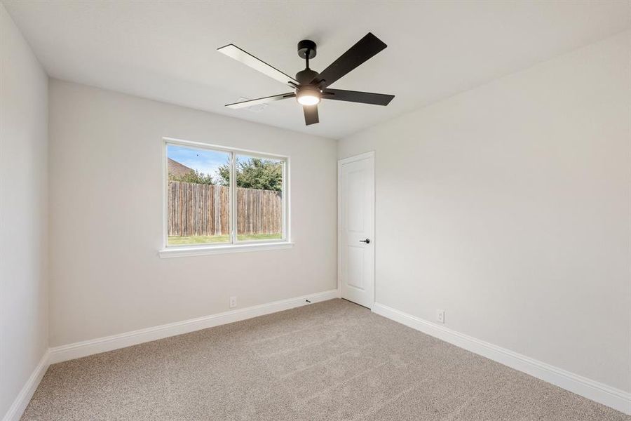 Spacious, unfurnished interior of a new home in Country Lakes Classic 50, Denton (Image 32).