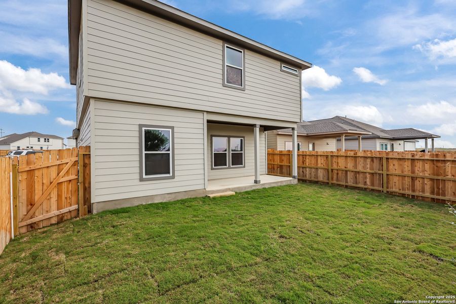 Exterior details and patio area of a home in Garden Grove, Schertz (Image 22).